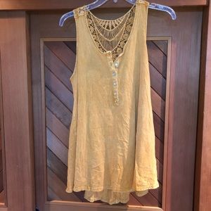 Stonewashed yellow Anthropologie blouse.